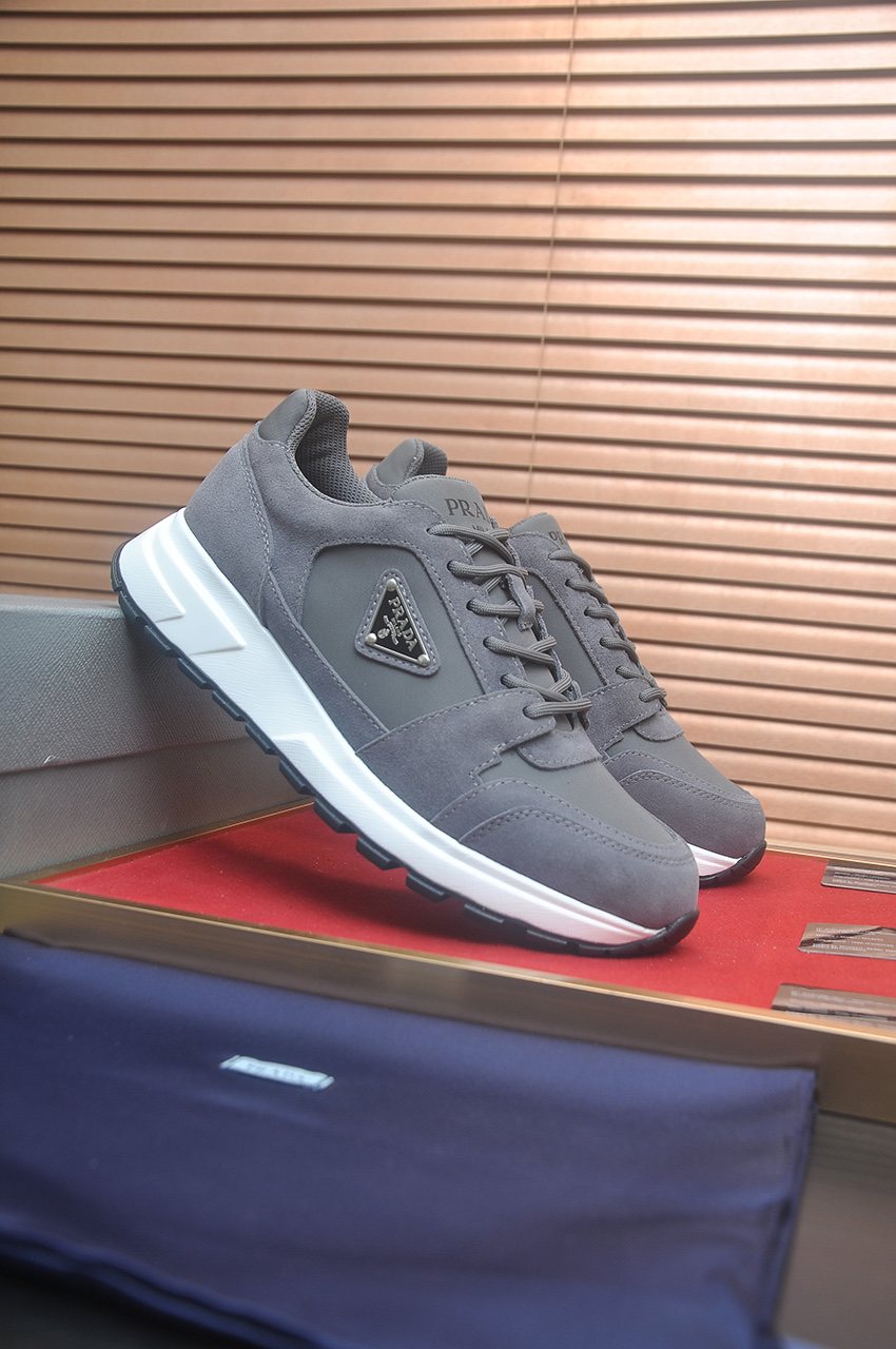 Prada Triangle Plaque Low-Top Sneakers - Lace-Up Closure